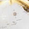 White & Gold Aluminum Tabletop Globe in Arrow Stand